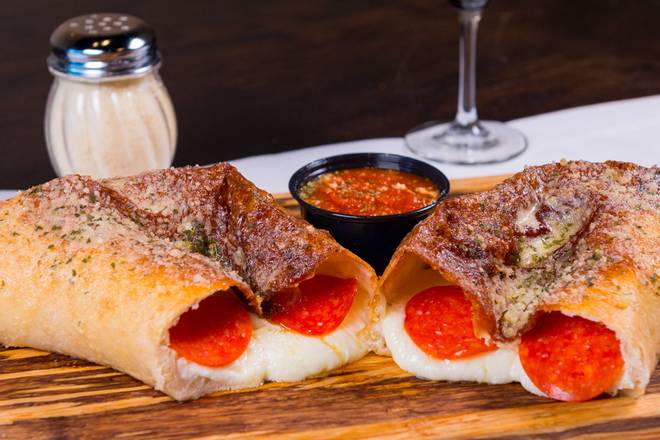 Order Small Calzone food online from Emilios Pizzeria & Restaurante store, Saint Cloud on bringmethat.com
