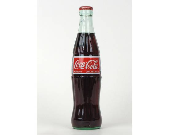 Order Coca Cola Glass Bottle food online from Gonzalo Taqueria Y Carnitas store, Lake Worth on bringmethat.com