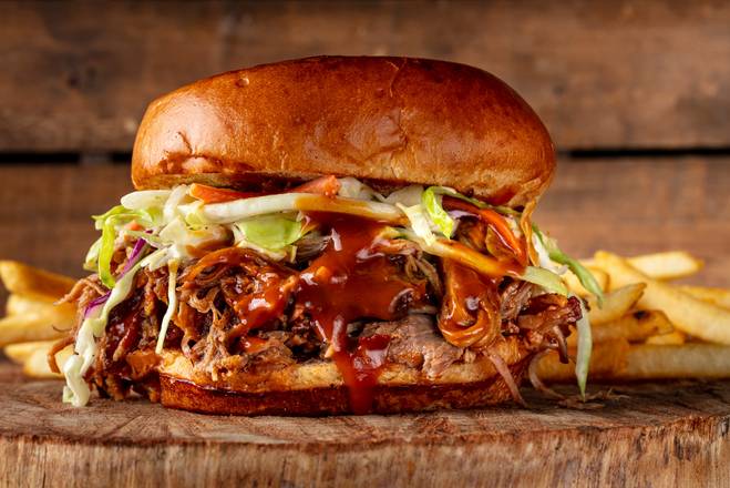 Order Carolina Pulled Pork  food online from Bad to The Bone BBQ store, San Juan Capistrano on bringmethat.com