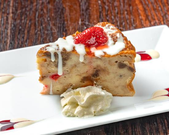 Order Rum and Raisin bread pudding food online from Breezes Island Grill store, New York on bringmethat.com