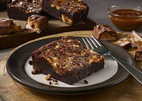 Order Caramel Crunch Brownie made with Snickers food online from Dickey Barbecue Pit store, Orlando on bringmethat.com