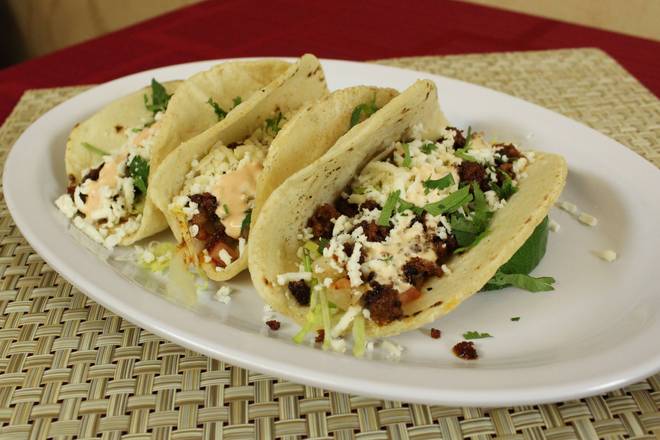 Order Chorizo Taco (Sausage) food online from Churrasco Fusion store, West Palm Beach on bringmethat.com