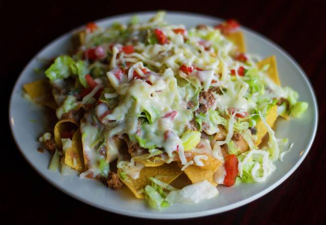 Order Loaded Nachos food online from Pesos Mexican Cantina store, Decatur on bringmethat.com