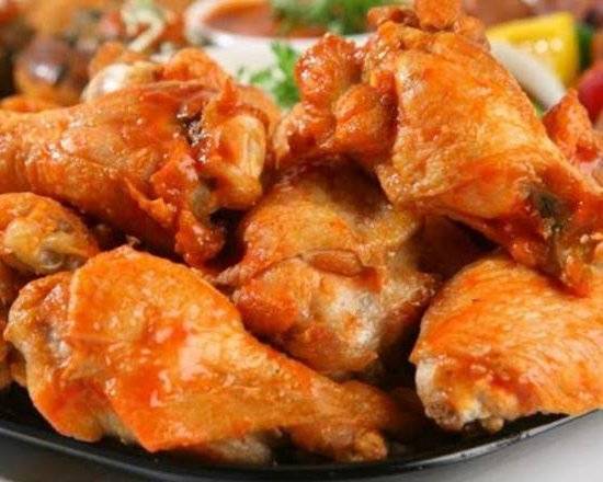 Order Fresh Jumbo Buffalo Wings food online from Moretti Pizzeria & Bar store, McHenry on bringmethat.com