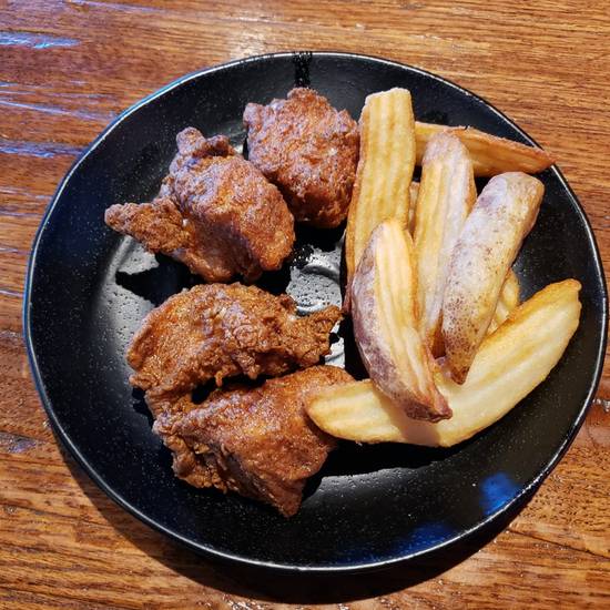 Order Kid's 4 Piece Nuggets food online from Wild Wing Cafe store, Greenville on bringmethat.com