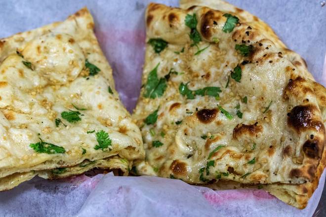 Order Garlic Naan food online from Hot Masala Bistro store, Camp Hill on bringmethat.com
