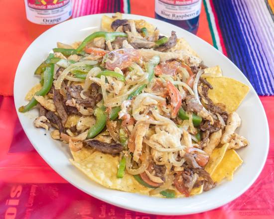 Order Nacho Fajita food online from El Canelo store, New Castle on bringmethat.com