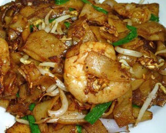 Order Singapore Flat Rice Noodles food online from Secret Recipe store, Carrollton on bringmethat.com