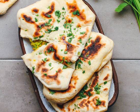Order Stuffed Naan food online from Desi Chops store, Chicago on bringmethat.com
