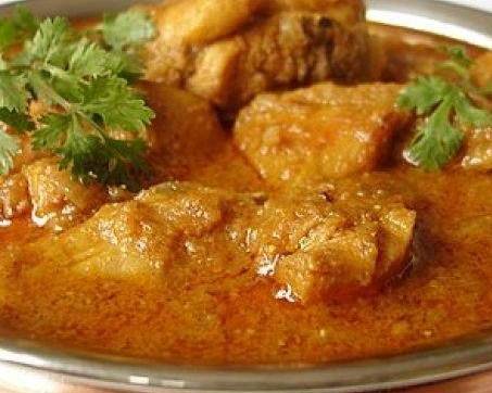 Order Chicken Curry food online from Tikka Island store, San Antonio on bringmethat.com