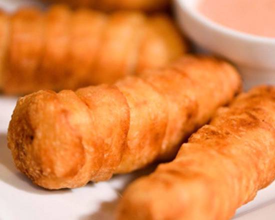 Order Tres Tequeños (Three Cheese Sticks) food online from Arepas Donde Flor store, Riverview on bringmethat.com