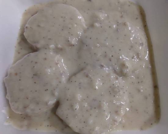 Order Full of Biscuits and Gravy food online from Jans Cafe store, Greenacres on bringmethat.com