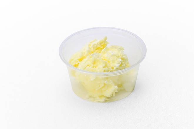 Order Side of Butter food online from Slim Chickens store, Collierville on bringmethat.com