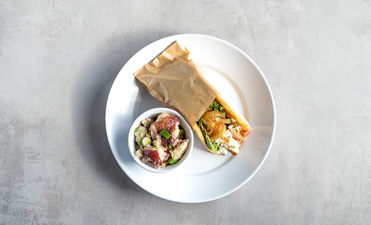 Order Greek Chicken Pita food online from Zoe's Kitchen store, Dallas on bringmethat.com