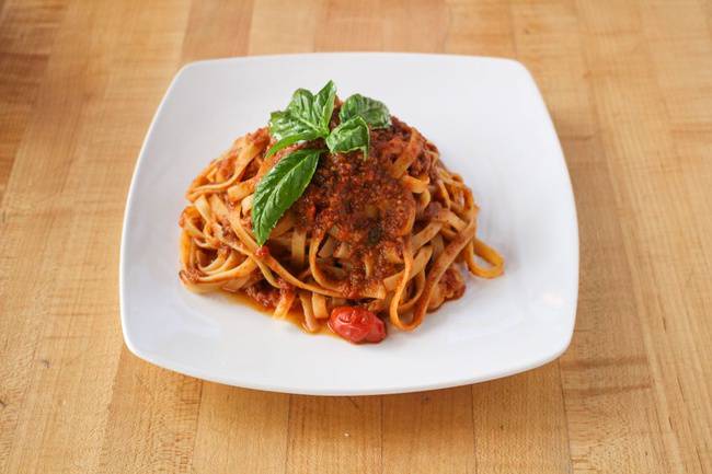 Order Fettuccine Bolognese Pasta food online from Pummarola store, Coral Gables on bringmethat.com