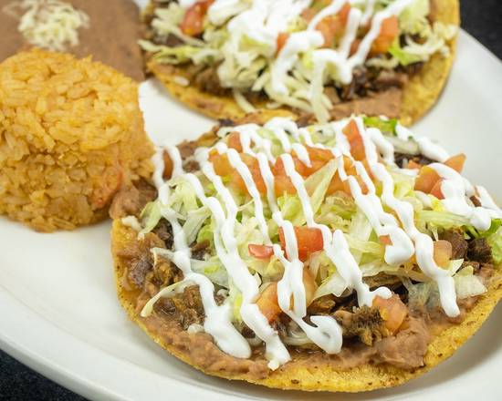 Order Dos Tostadas con Arroz y Frijoles food online from Los Fernandez store, Streamwood on bringmethat.com