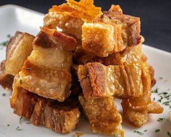 Order Chicharron Con Arepa O Toston food online from El Mayoral De Sunset store, Miami on bringmethat.com