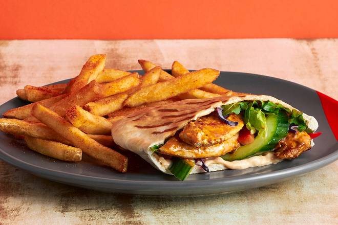 Order Chicken Breast Pita food online from Nando's Peri-Peri store, College Park on bringmethat.com