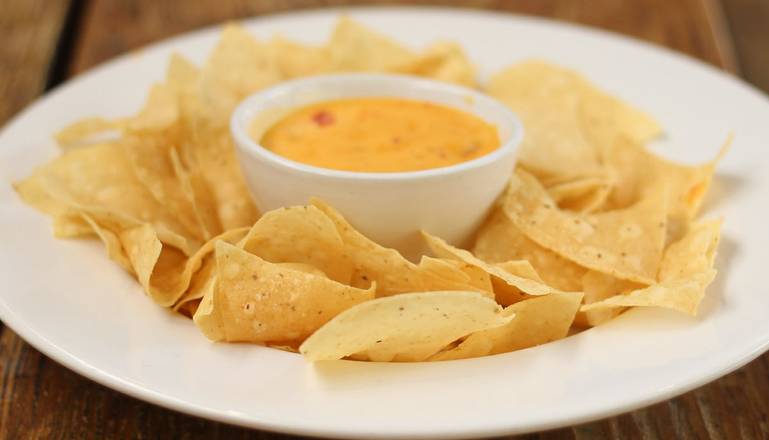 Order Chips & Queso food online from Pluckers store, Baton Rouge on bringmethat.com