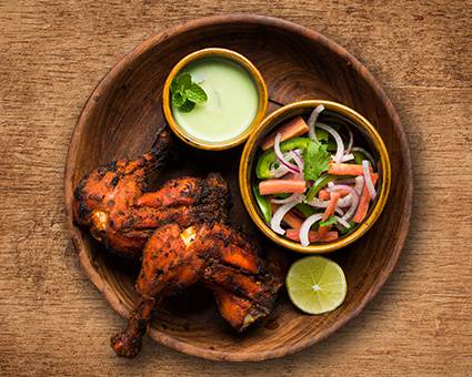 Order Charred Tandoori Chicken food online from United Kitchens Of India store, Schaumburg on bringmethat.com