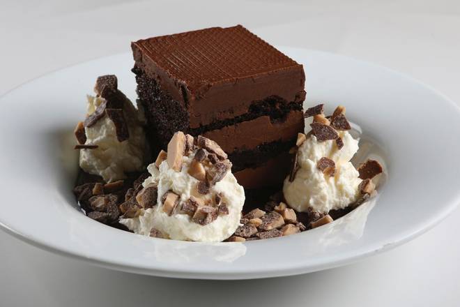 Order DECADENT CHOCOLATE CAKE food online from Romano's Macaroni Grill - Carrollwood store, Tampa on bringmethat.com