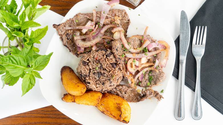 Order Bistec de Palomilla (Steak Entree) food online from Geo's Cuban store, Seattle on bringmethat.com