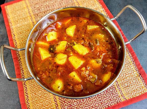 Order Aloo Sabzee 16oz food online from Mezban Restaurant store, Houston on bringmethat.com