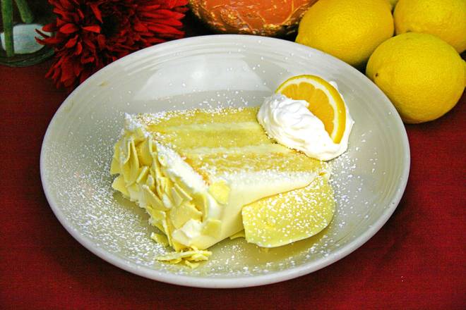 Order Lemon Custard Cake food online from Eddie's Italian Eatery store, Claremont on bringmethat.com