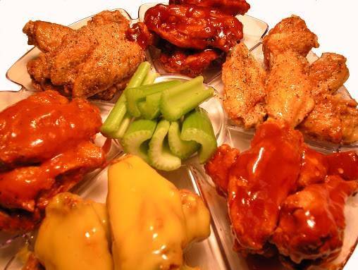 Order Buffalo Wings- 20 PCs food online from Sharks Seafood & More store, Bowie on bringmethat.com