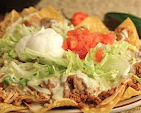 Order Nachos Supremos food online from El Canelo store, New Castle on bringmethat.com