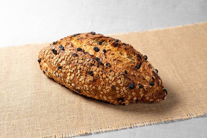 Order Five Grain & Raisins Loaf food online from Le Pain Quotidien store, New Canaan on bringmethat.com