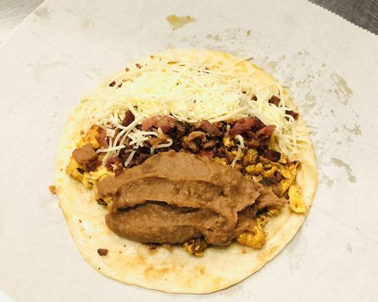 Order Chorizo, Egg, Bacon, Bean, & Cheese food online from Donut Tacos Palace store, Austin on bringmethat.com