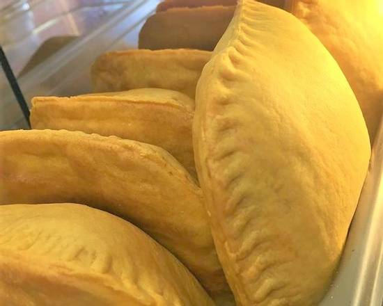 Order Patties (Beef, Chicken, Veggie) food online from Cravin Jamaican Cuisine store, Ossining on bringmethat.com