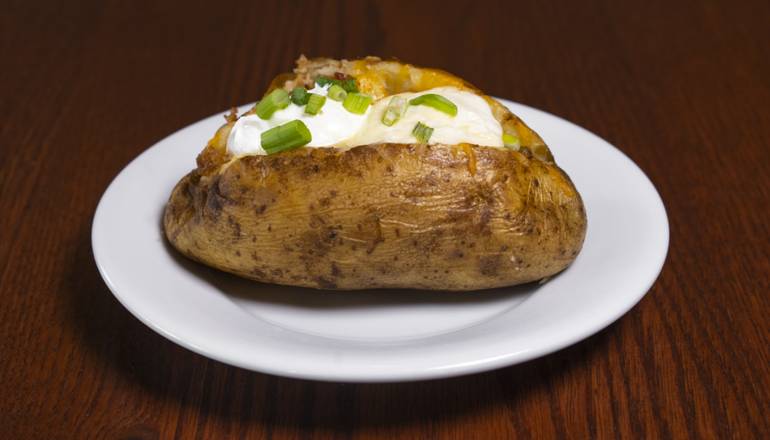 Order Loaded Baked Potato food online from Smokey Bones store, Colonie on bringmethat.com