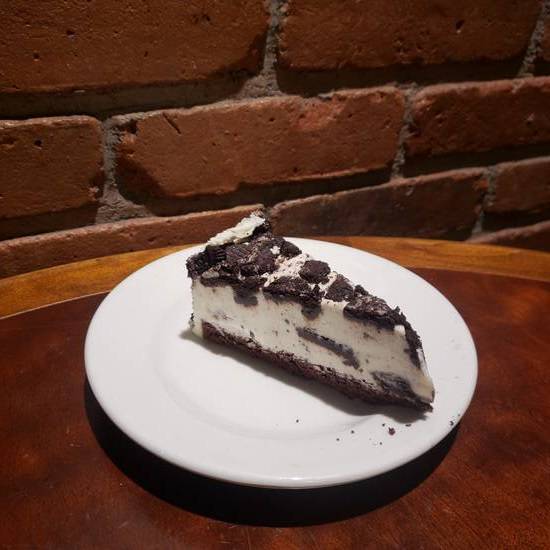 Order Oreo Mousse Cheesecake food online from Wild Corgi Pub store, Denver on bringmethat.com