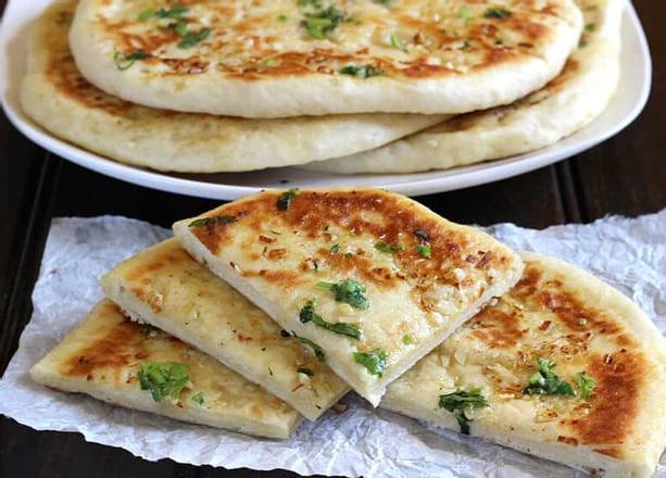 Order Cotty Cheese Naan food online from Desi Chops store, Terrace on bringmethat.com