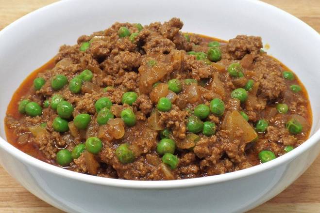 Order Qeema Matar food online from Hadi Restaurant store, New York on bringmethat.com