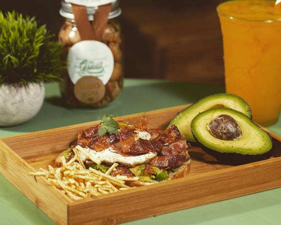 Order Avocado 陋 TOAST WITH FRIED EGGS AND BACON  food online from The Grove Coffee House store, Davie on bringmethat.com