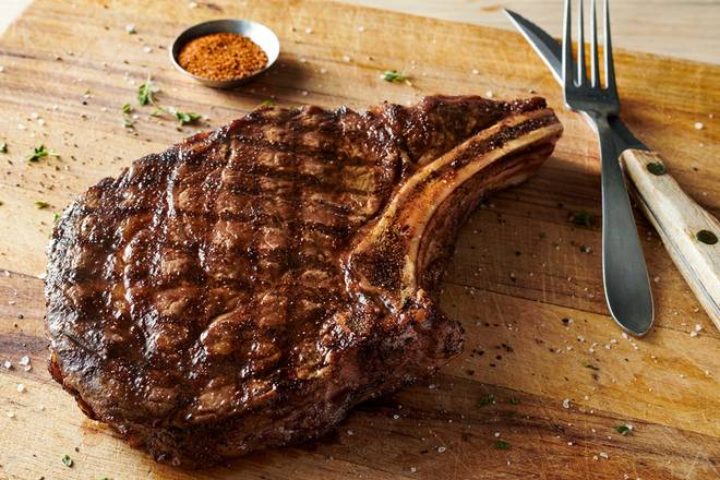 Order Bone-In Ribeye* 18 oz. food online from Outback Steakhouse store, Daly City on bringmethat.com
