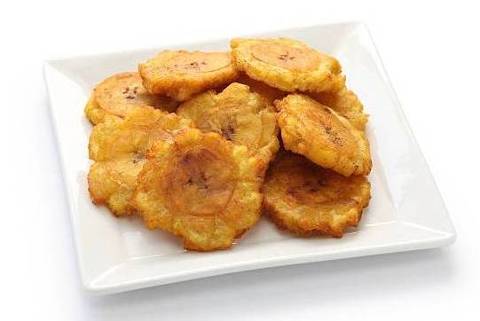 Order Tostones - 2 pcs food online from Maikel Kitchen store, Fort Myers on bringmethat.com