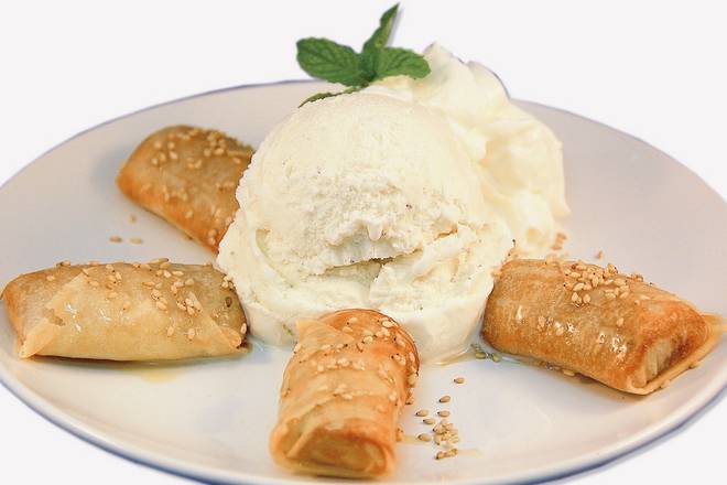 Order Fried Banana with vanila ice cream food online from Red basil thai kitchen store, Long Island City on bringmethat.com