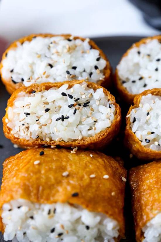 Order 42.Sweet Tofu Skin (Inari) food online from Fuji Revolving Sushi Bar store, Cypress on bringmethat.com