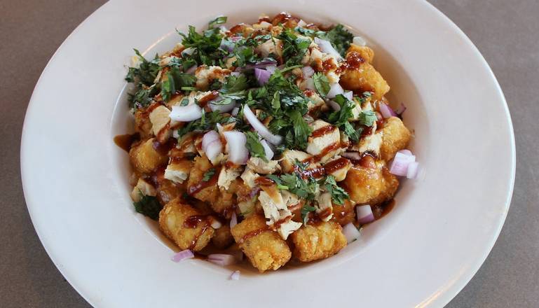 Order Pluckers Totchos food online from Pluckers Wing Bar store, Addison on bringmethat.com