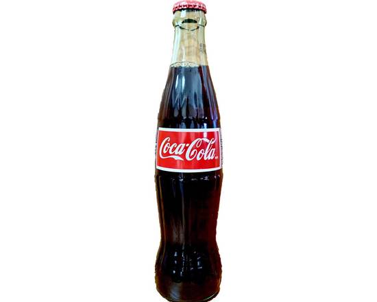 Order Coke ( mexican style ) Bottled Soda food online from Mezban Restaurant store, Houston on bringmethat.com