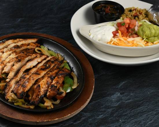 Order Amazon Fajitas - Chicken food online from Rainforest Cafe - Galveston store, Galveston on bringmethat.com