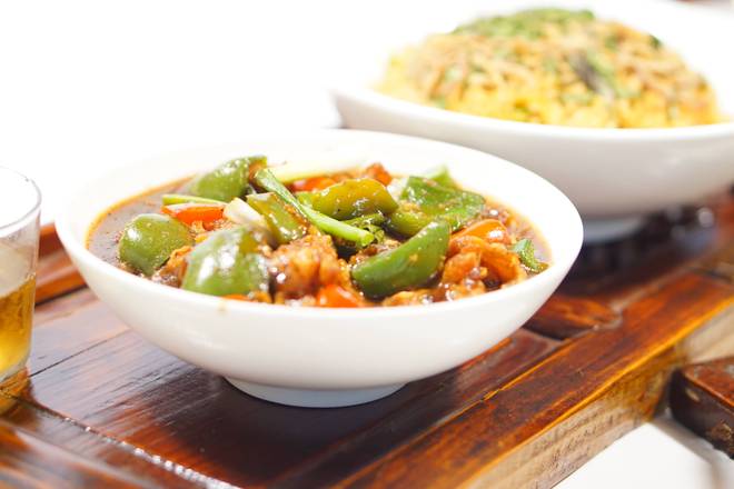 Order Garlic Pepper Chicken food online from Inchin Bamboo Garden store, Nashville on bringmethat.com