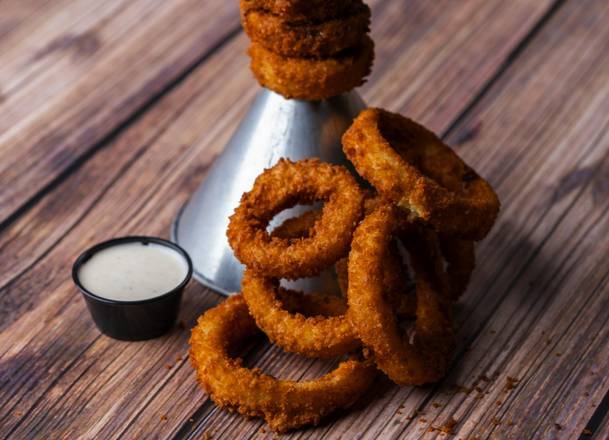 Order Giant Funnel Tower of Jumbo Piston Onion Rings food online from Ford Garage store, Cape Coral on bringmethat.com