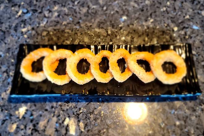 Order Calamari Ring - 7 pcs food online from Old Village Korean Bistro store, Shoreline on bringmethat.com