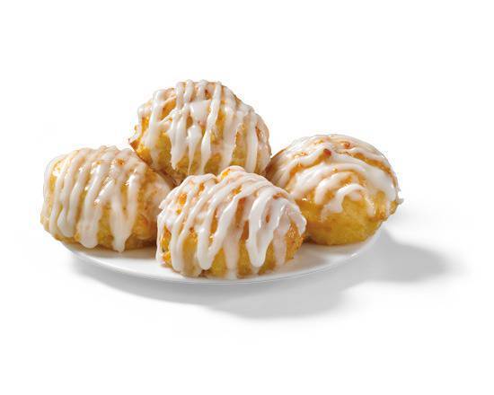 Order 4 Frosted Honey-Butter Biscuits food online from Church's Chicken store, Tampa on bringmethat.com
