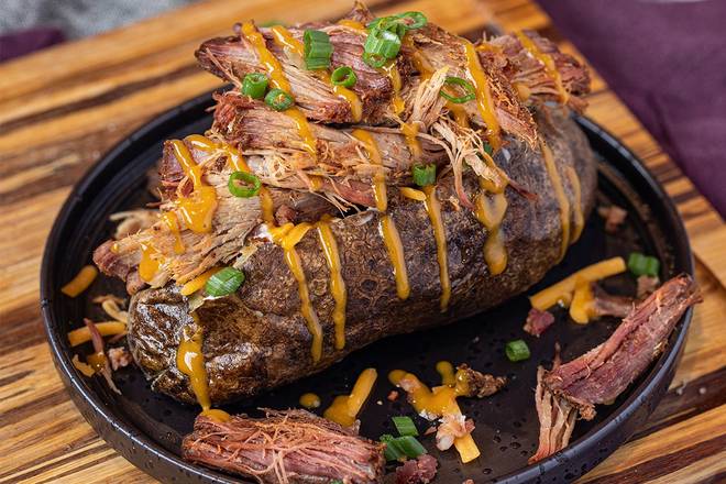 Order  Pulled Pork Spud food online from Ember Smoked BBQ store, Cape Girardeau on bringmethat.com